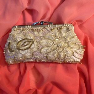 Pink beaded clutch